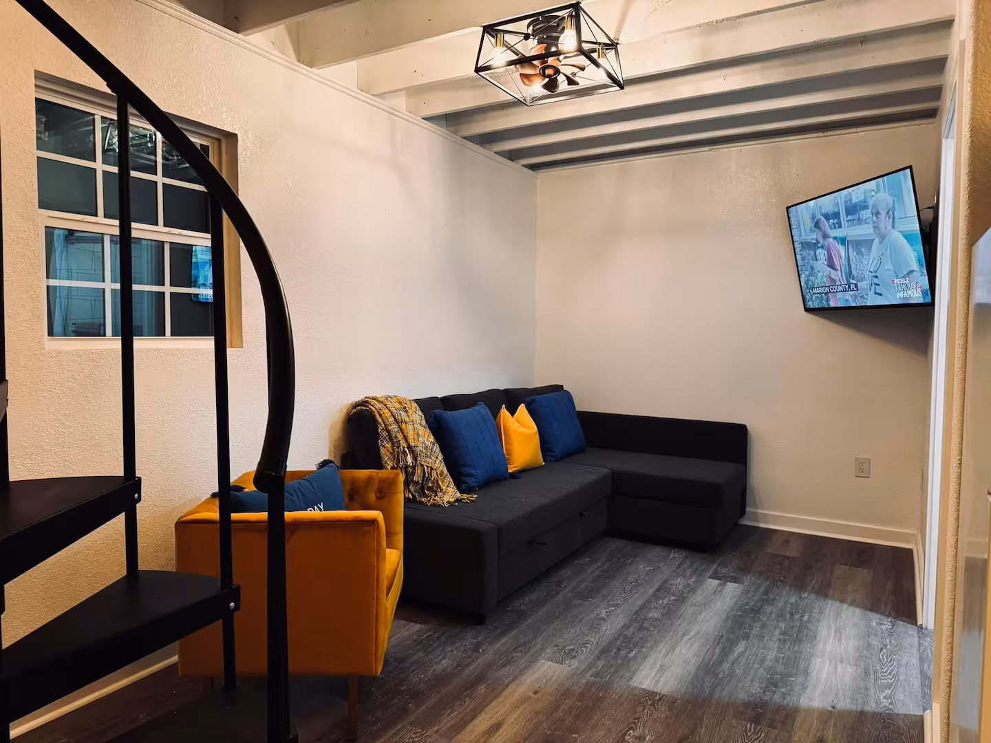 Living room with sectional & TV