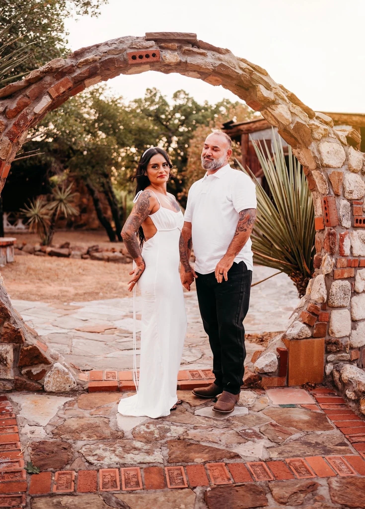 Couple portrait under the stone arch